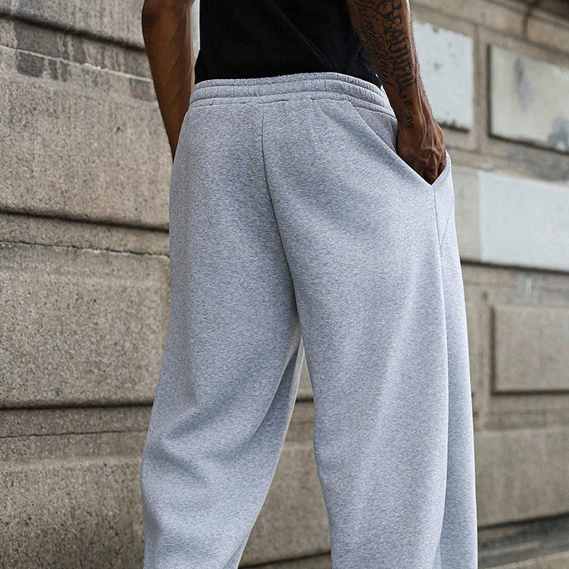 Unisex-rennot leveälahkeiset housut
