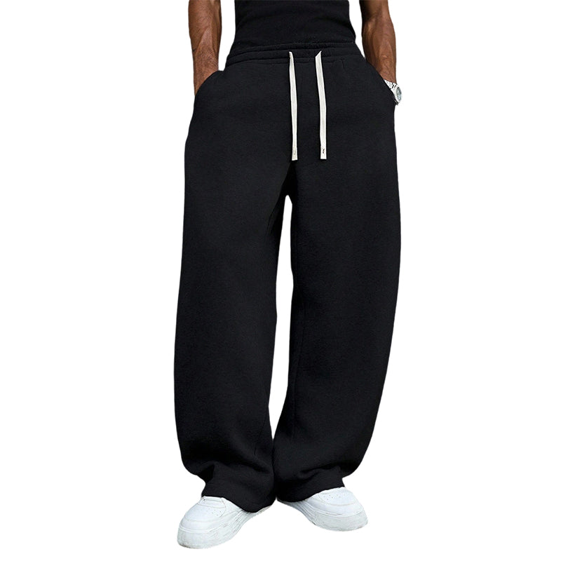Unisex-rennot leveälahkeiset housut
